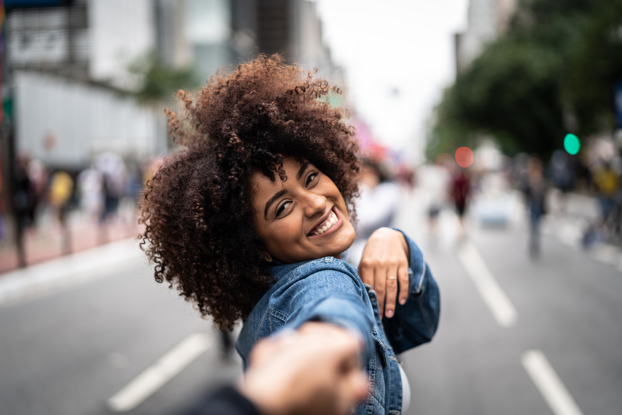 Smile makeover near Aberdeen – happy woman showing off her confident new smile